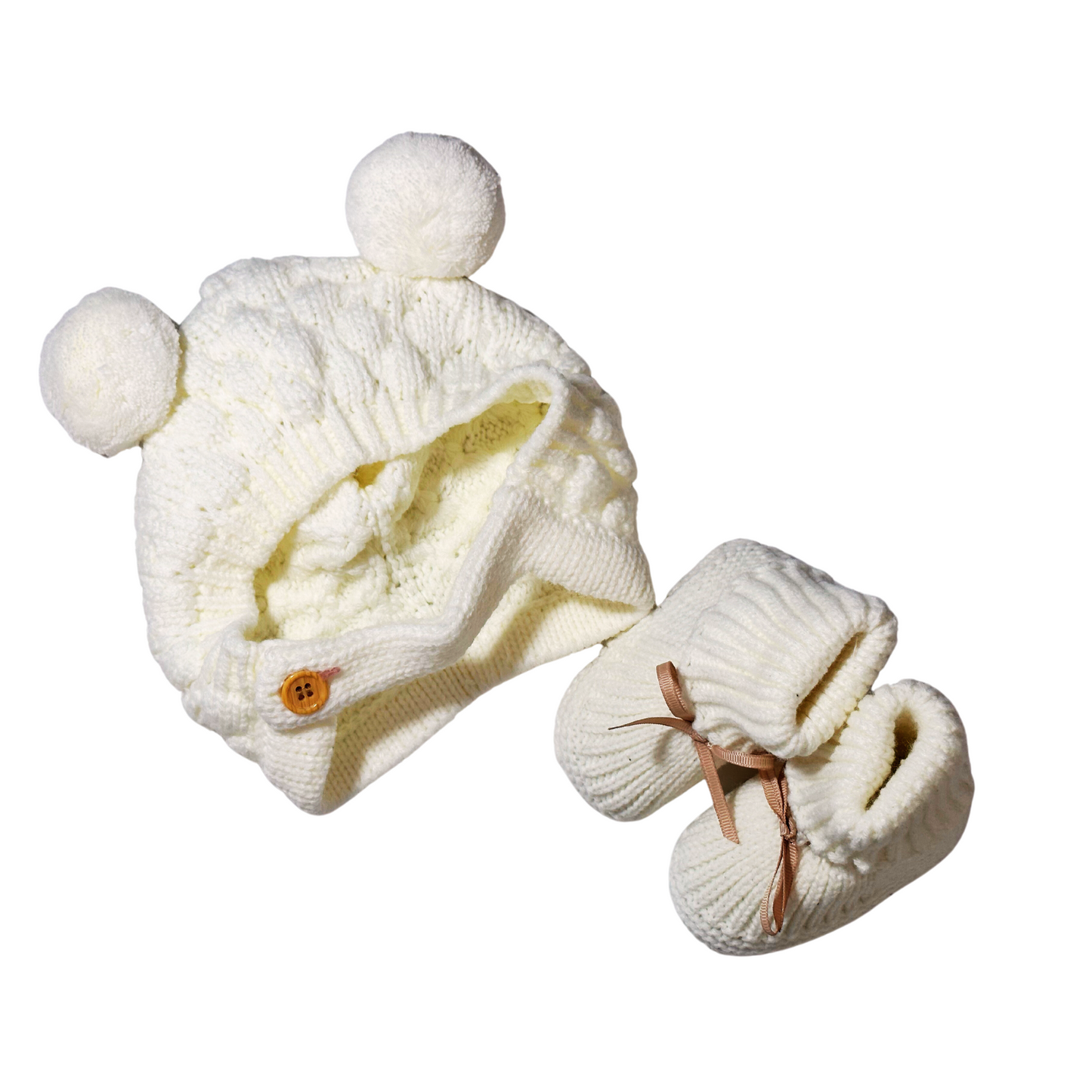 Gorro y zapatitos tejidos