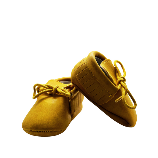 Zapatitos de cuero con flecos
