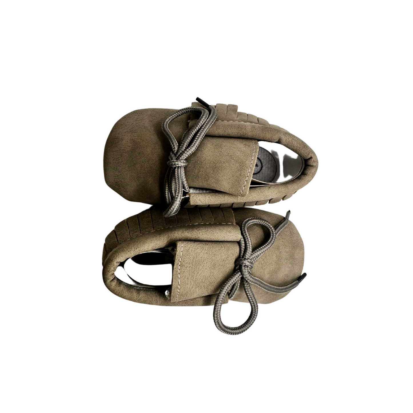 Zapatitos de cuero con flecos